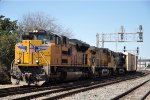 Eastbound manifest rolls past the station